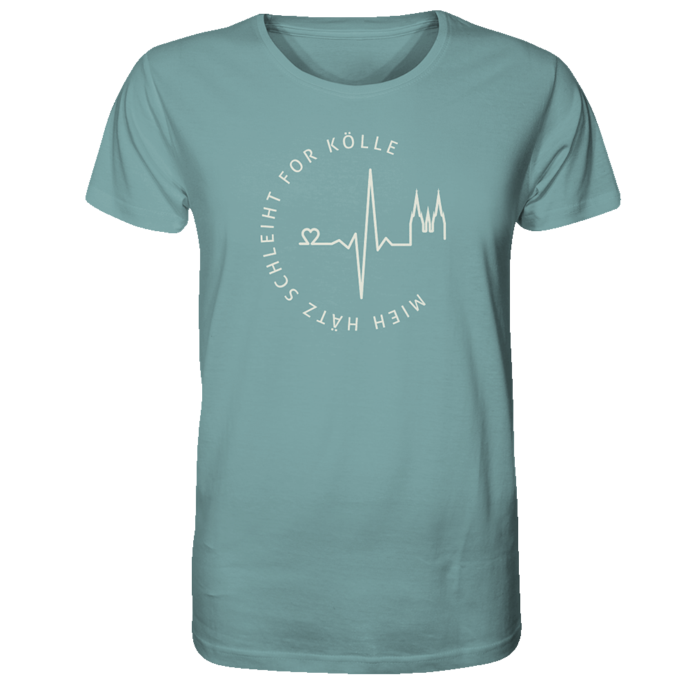 Unisex T-Shirt aus Biobaumwolle in türkis-blau mit beigen Aufdruck Mieh Hätz schleiht for Kölle. Der Spruch ist rund aufgedruckt. In der Mitte befindet sich eine Grafik mit einem Herzschlag. Der Herschlag beginnt mit einem Herz und endet mit einer Grafik des Kölner Doms.