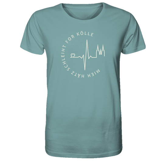 Unisex T-Shirt aus Biobaumwolle in türkis-blau mit beigen Aufdruck Mieh Hätz schleiht for Kölle. Der Spruch ist rund aufgedruckt. In der Mitte befindet sich eine Grafik mit einem Herzschlag. Der Herschlag beginnt mit einem Herz und endet mit einer Grafik des Kölner Doms.